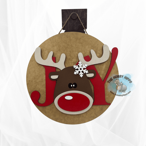 A finished inspiration photo of the wall or door hanger with the word "JOY" and the "O" being a reindeer face. 