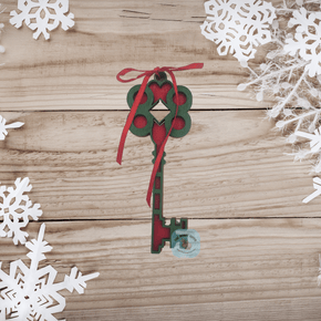 Santa Key that is for Christmas decor. Laser cut from wood, two layers to make it appear thick. Comes painted red and green and the two layers glued together with a red ribbon. 