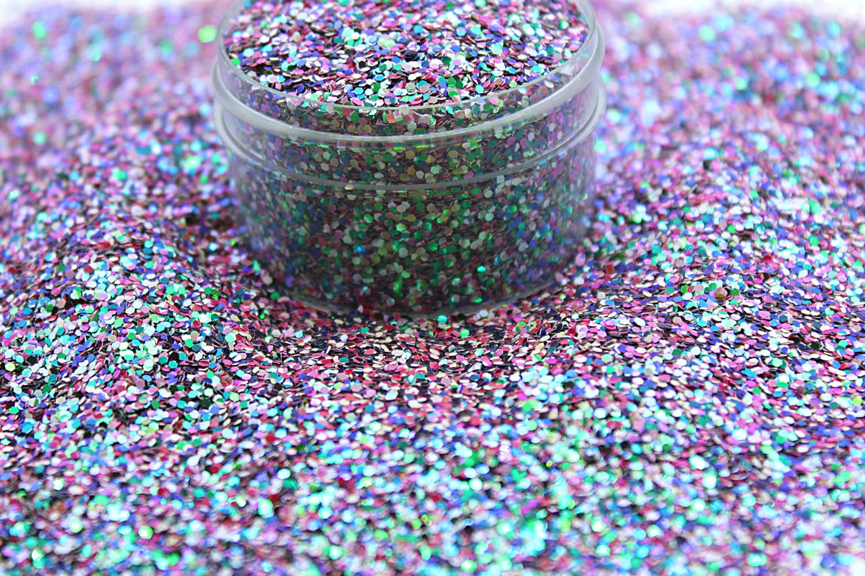 A green, light pink, and dark pink glitter mix