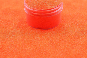 An orange shimmer glitter not sparkly